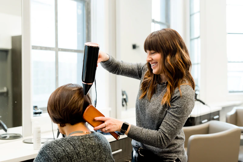 Stylist giving personal attention to a client